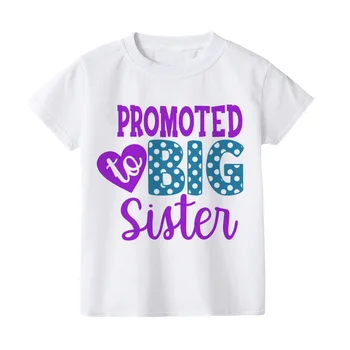 Aš būsiu didelės sesers marškinėliai Kūdikio skelbimas Didžiosios sesers brolių ir seserų drabužių viršūnės Mažylio vaivorykštės marškiniai Mergaitė Vaikų drabužiai